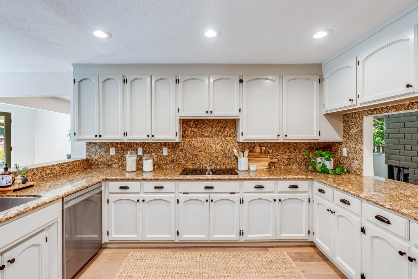 140 Echo Ridge Lane Soquel, CA 95073 - Photo 12 of 50 a kitchen with granite countertop white cabinets and stainless steel appliances