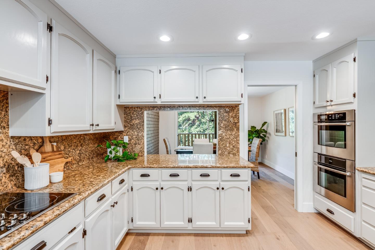 140 Echo Ridge Lane Soquel, CA 95073 - Photo 13 of 50 a kitchen with stainless steel appliances granite countertop a stove a sink and a refrigerator