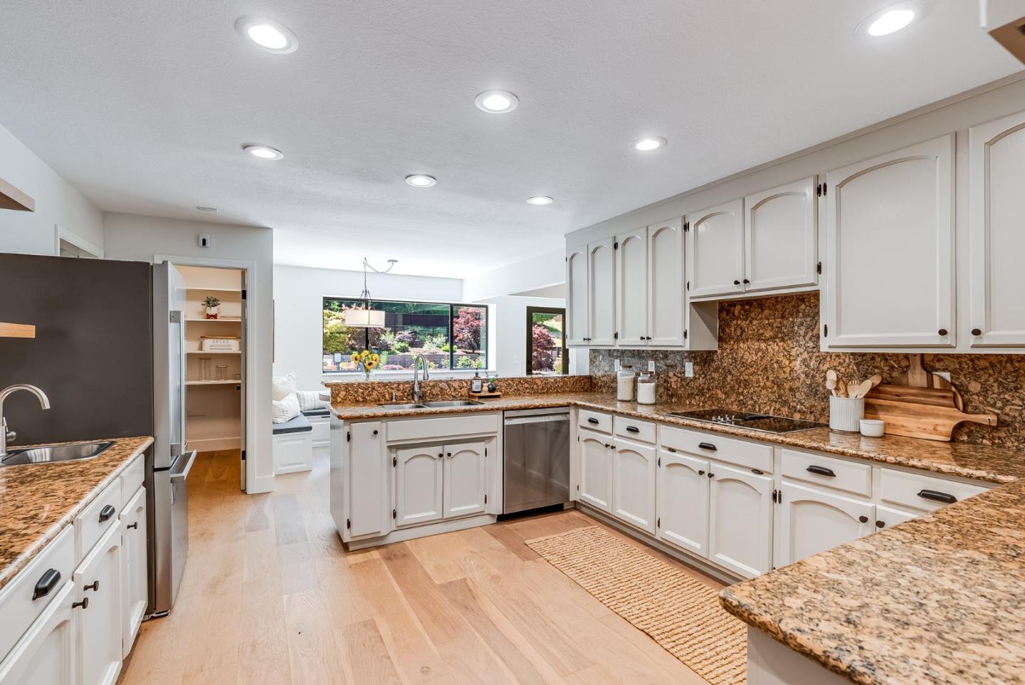 140 Echo Ridge Lane Soquel, CA 95073 - Photo 14 of 50 a large kitchen with stainless steel appliances granite countertop a stove and a sink