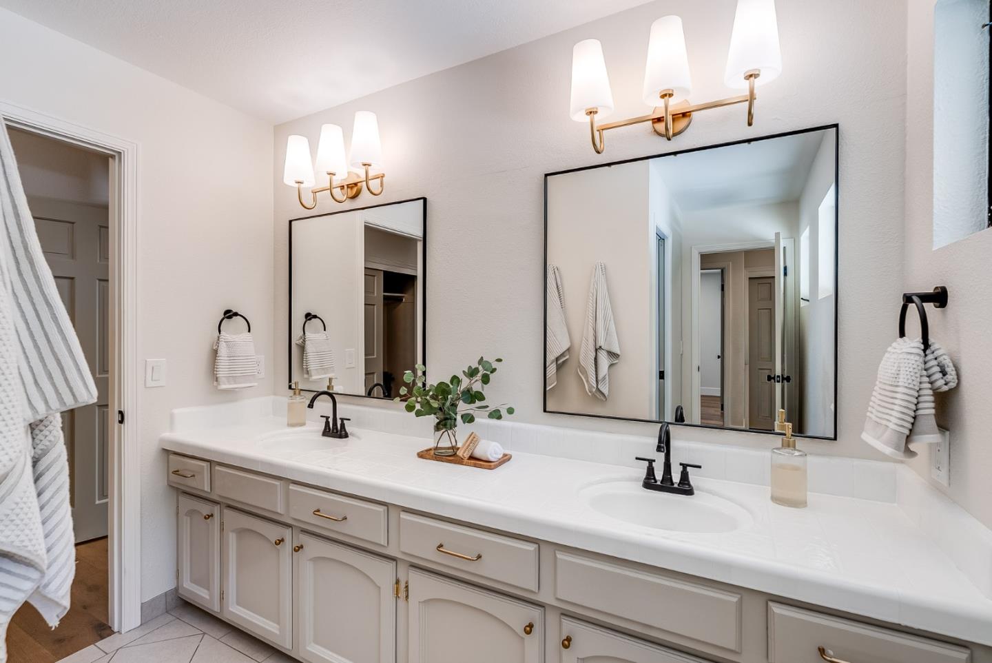 140 Echo Ridge Lane Soquel, CA 95073 - Photo 22 of 50 a bathroom with double vanity sinks and a mirror