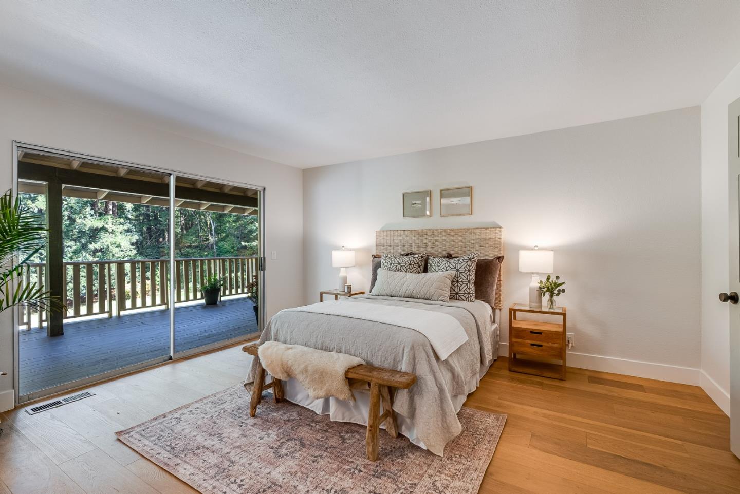 140 Echo Ridge Lane Soquel, CA 95073 - Photo 26 of 50 a bedroom with a bed and wooden floor