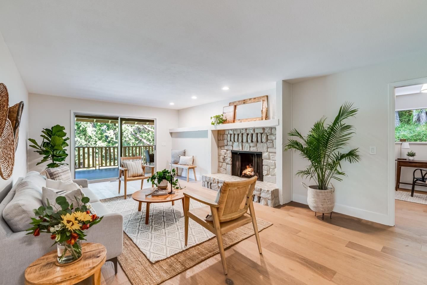 140 Echo Ridge Lane Soquel, CA 95073 - Photo 31 of 50 a living room with furniture a fireplace and a potted plant