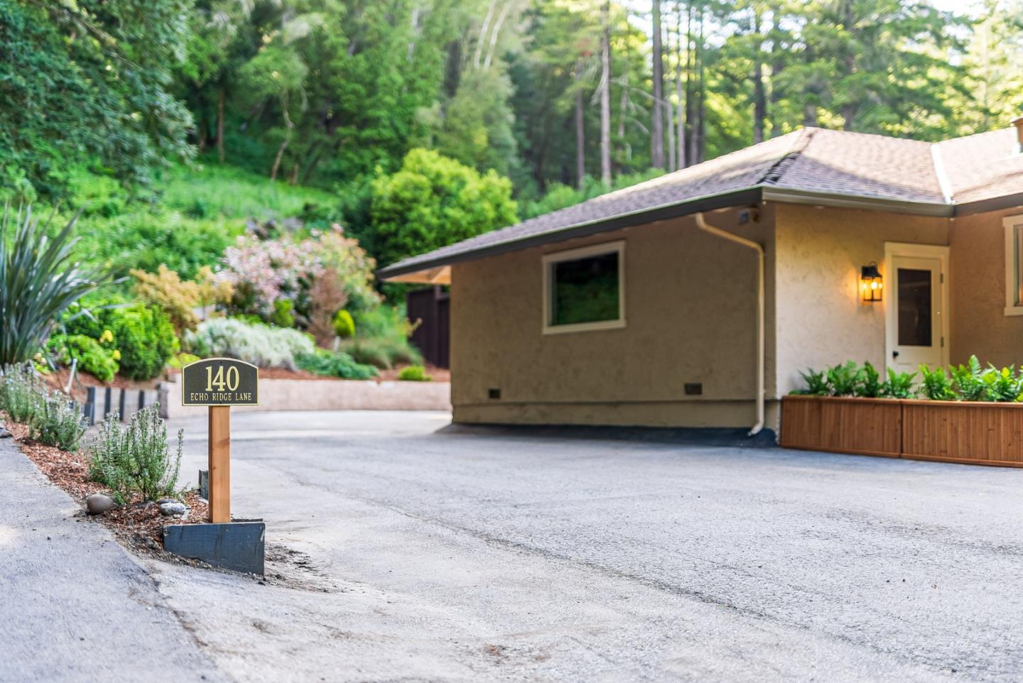 140 Echo Ridge Lane Soquel, CA 95073 - Photo 45 of 50 a backyard of a house with plants and trees