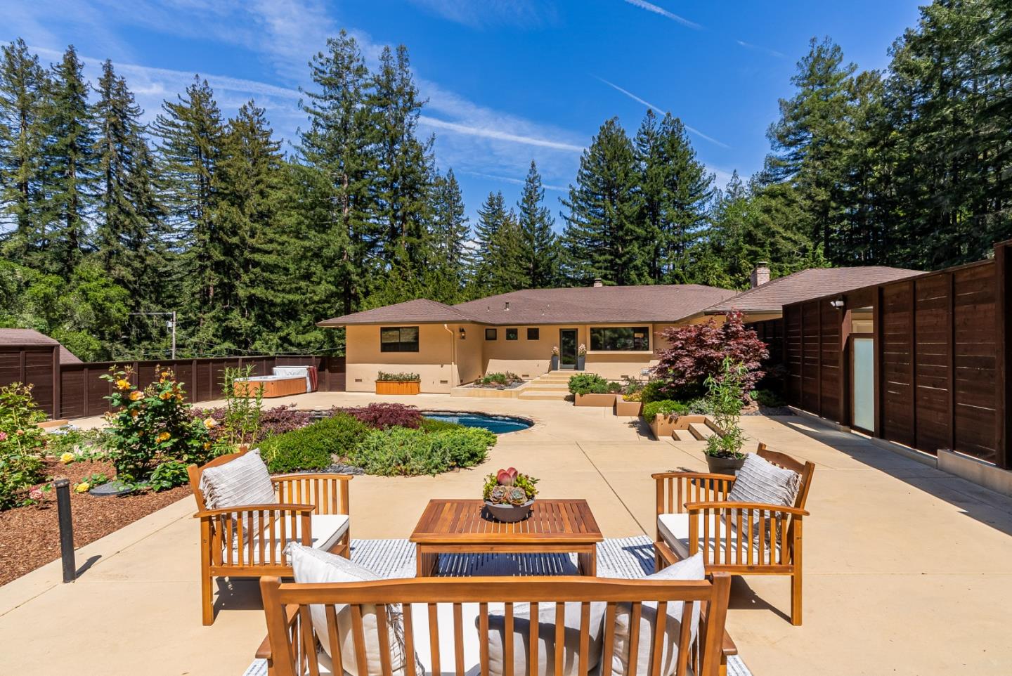140 Echo Ridge Lane Soquel, CA 95073 - Photo 4 of 50 a patio with table and chairs