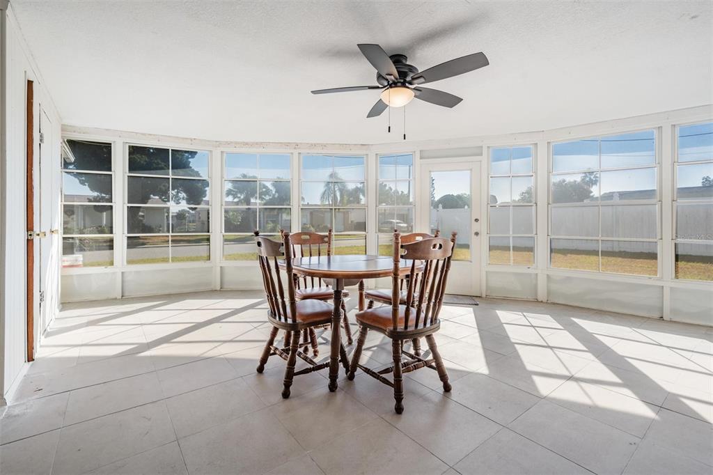 3608 Umber Road Holiday, FL 34691 - Photo 16 of 20 a dining room with furniture and window