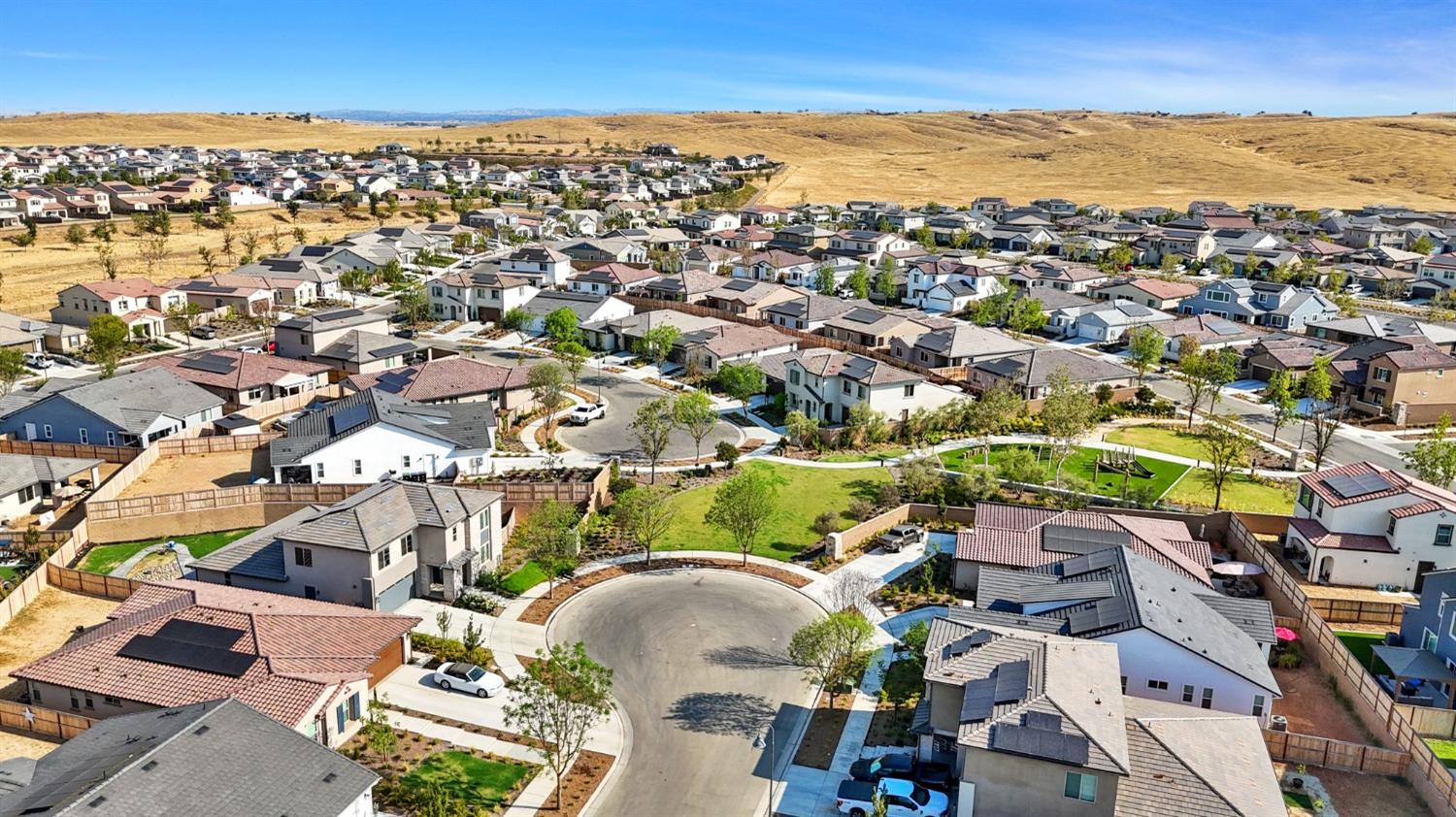 4218 Oak Knoll Road Madera, CA 93636 - Photo 30 of 37 an aerial view of a houses with a swimming pool
