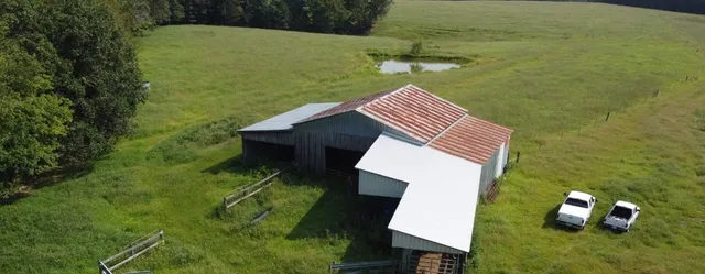a view of a yard with an outdoor space