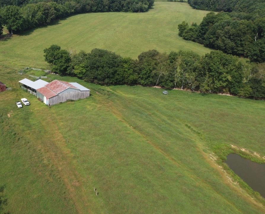 0 Neal Road Belvidere, TN 37306 - Photo 3 of 58 a view of a lake with a houses