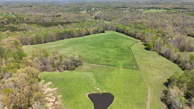 a view of a lake with a yard
