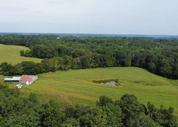 a view of a lake in middle of the town