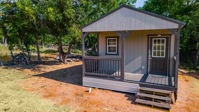 a view of a house with a swimming pool