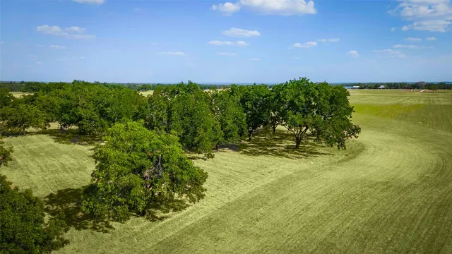 a view of a backyard with a patio