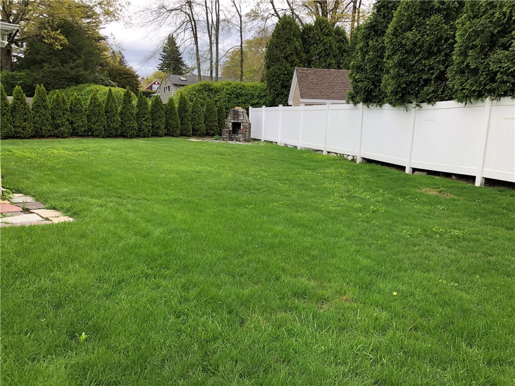 Rear yard is partially fenced.