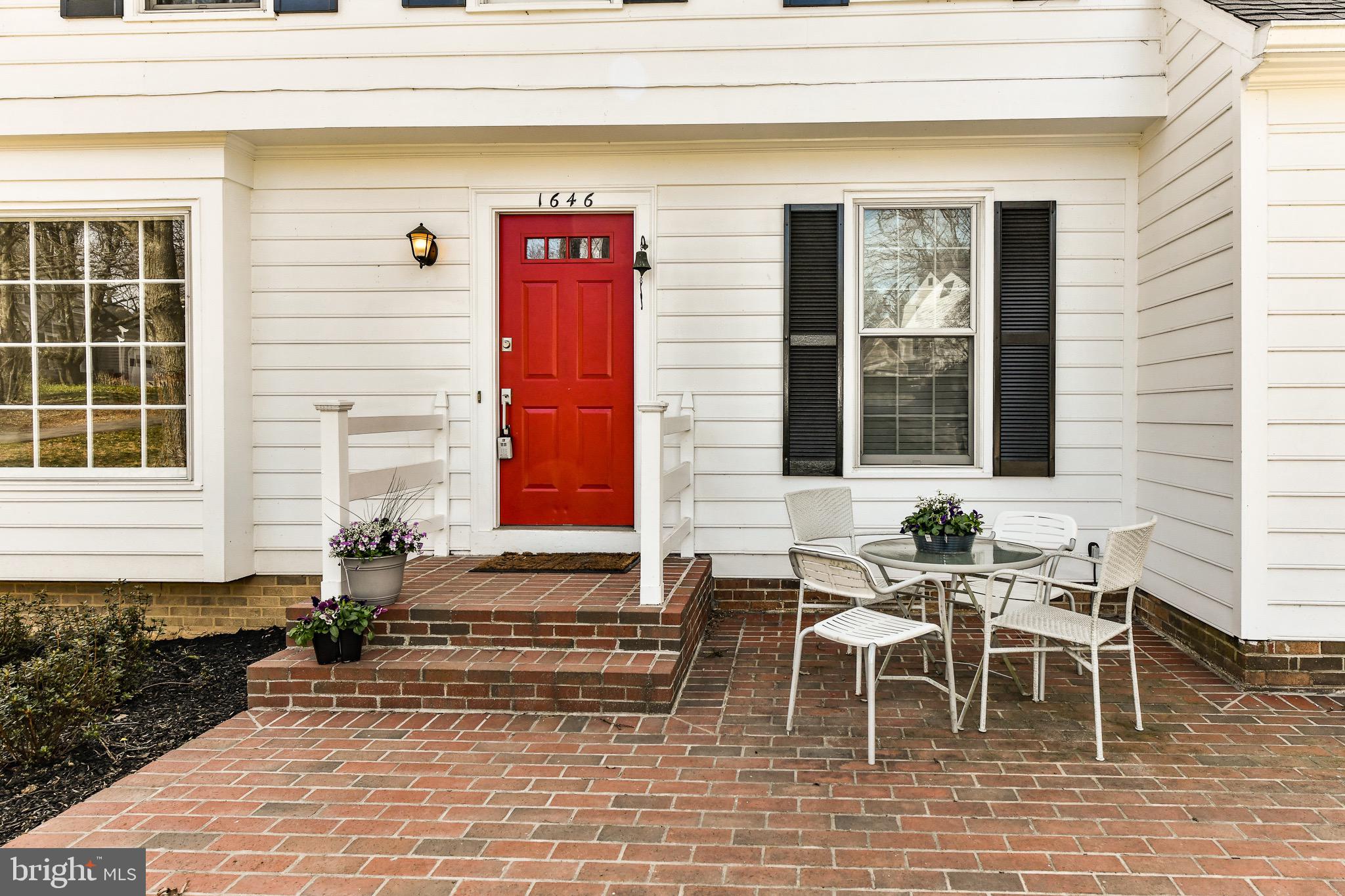 1646 Stowe Road Reston, VA 20194 - Photo 2 of 32 This Brick patio entrance will wow you every day