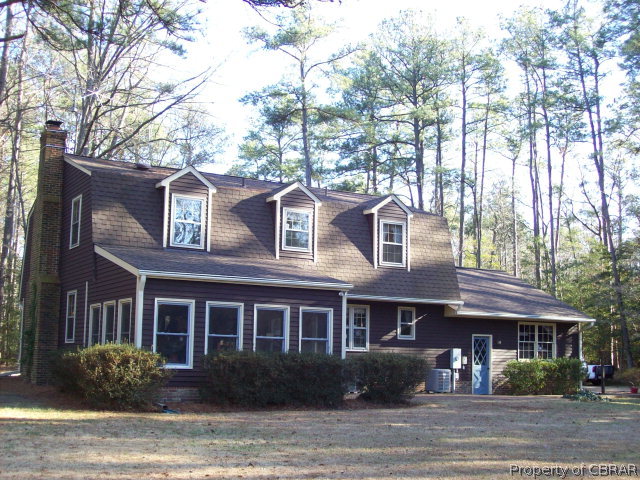 2118 Glebe Road Mathews, VA 23109 - Photo 2 of 22 a front view of a house