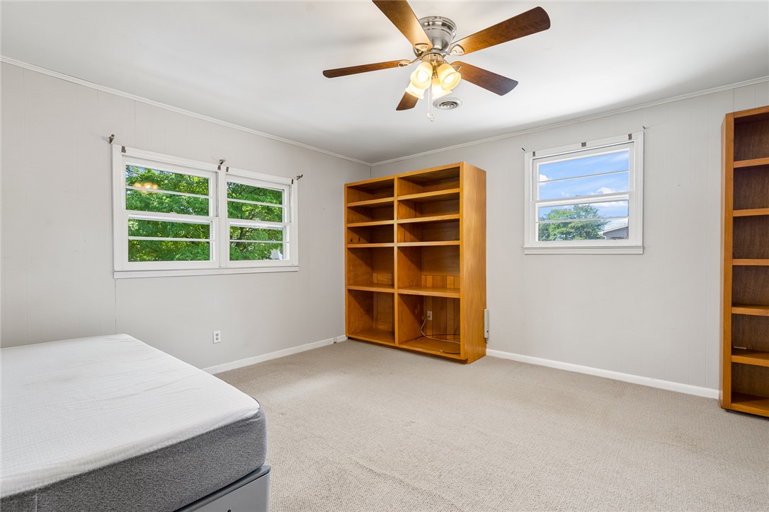 1509 869 Anderson, SC 29621 - Photo 22 of 45 Well-lit room with large windows, ideal for a comfortable private retreat.
