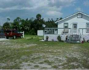 28750 South Jones Loop Road Punta Gorda, FL 33982 - Photo 1 of 1 Exterior Front