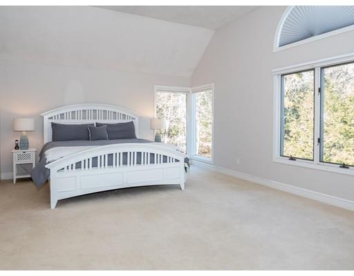 818 Long Pond Road Plymouth, MA 02360 - Photo 18 of 30 a view of a bedroom with bed and windows