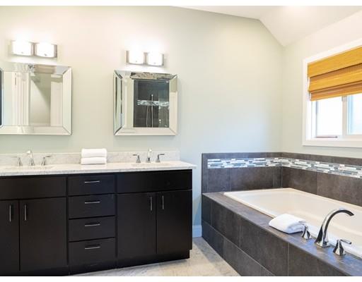 818 Long Pond Road Plymouth, MA 02360 - Photo 20 of 30 a bathroom with a tub sink and mirror