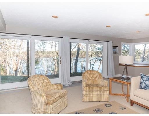 818 Long Pond Road Plymouth, MA 02360 - Photo 21 of 30 a living room with furniture and a floor to ceiling window