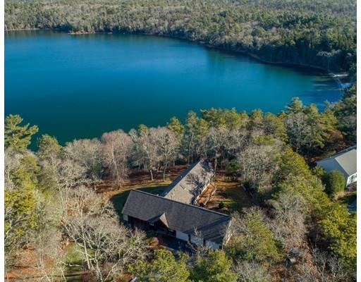818 Long Pond Road Plymouth, MA 02360 - Photo 5 of 30 an aerial view of a house with a yard and lake view