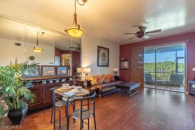 a view of a livingroom with furniture and a table
