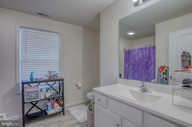 a view of a street with a city view