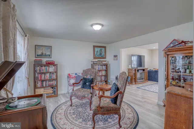 a view of walk in closet with clothes