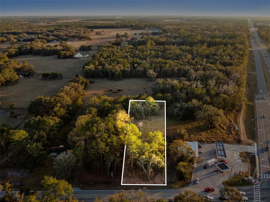 Powell Road Brooksville, FL 34604 - Photo 1 of 15 an aerial view of a house with a yard