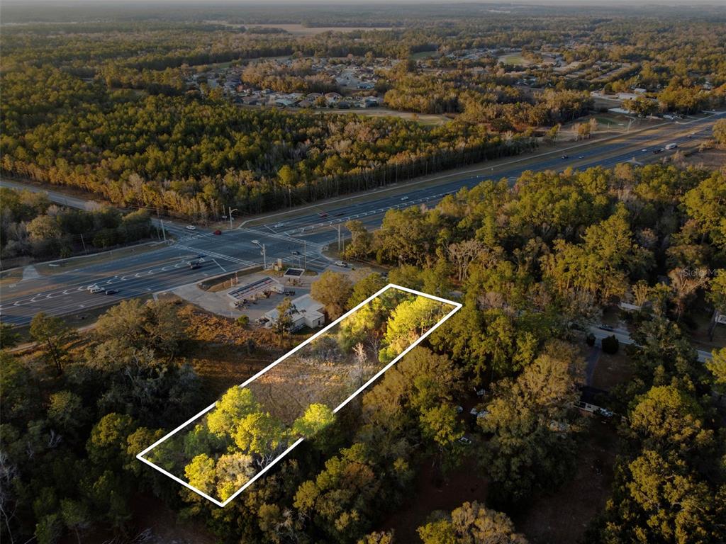 Powell Road Brooksville, FL 34604 - Photo 8 of 15 an aerial view of a house with a lake