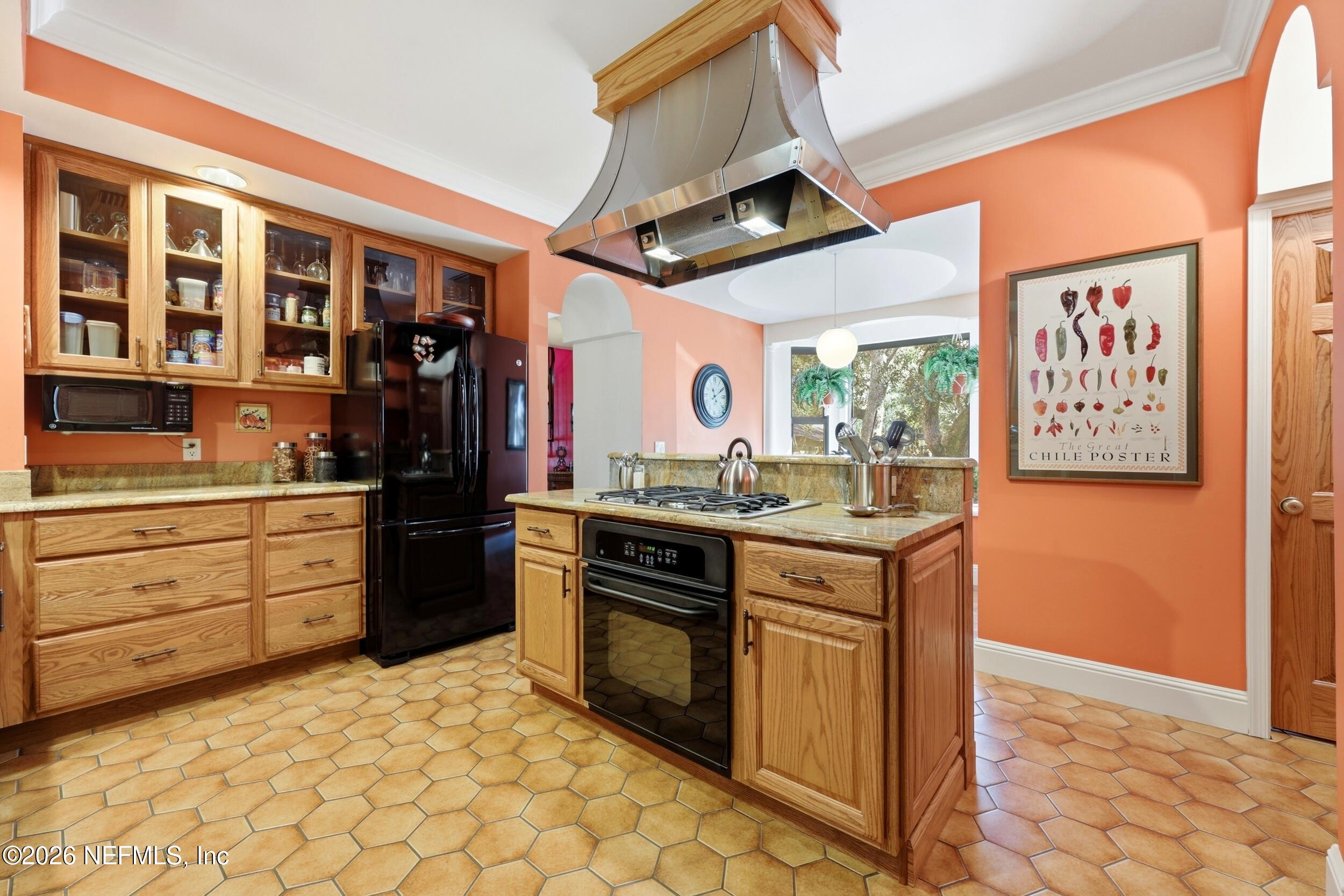 10 Lydia Lane St. Augustine, FL 32080 - Photo 20 of 119 a kitchen with stainless steel appliances granite countertop a stove a sink and a refrigerator