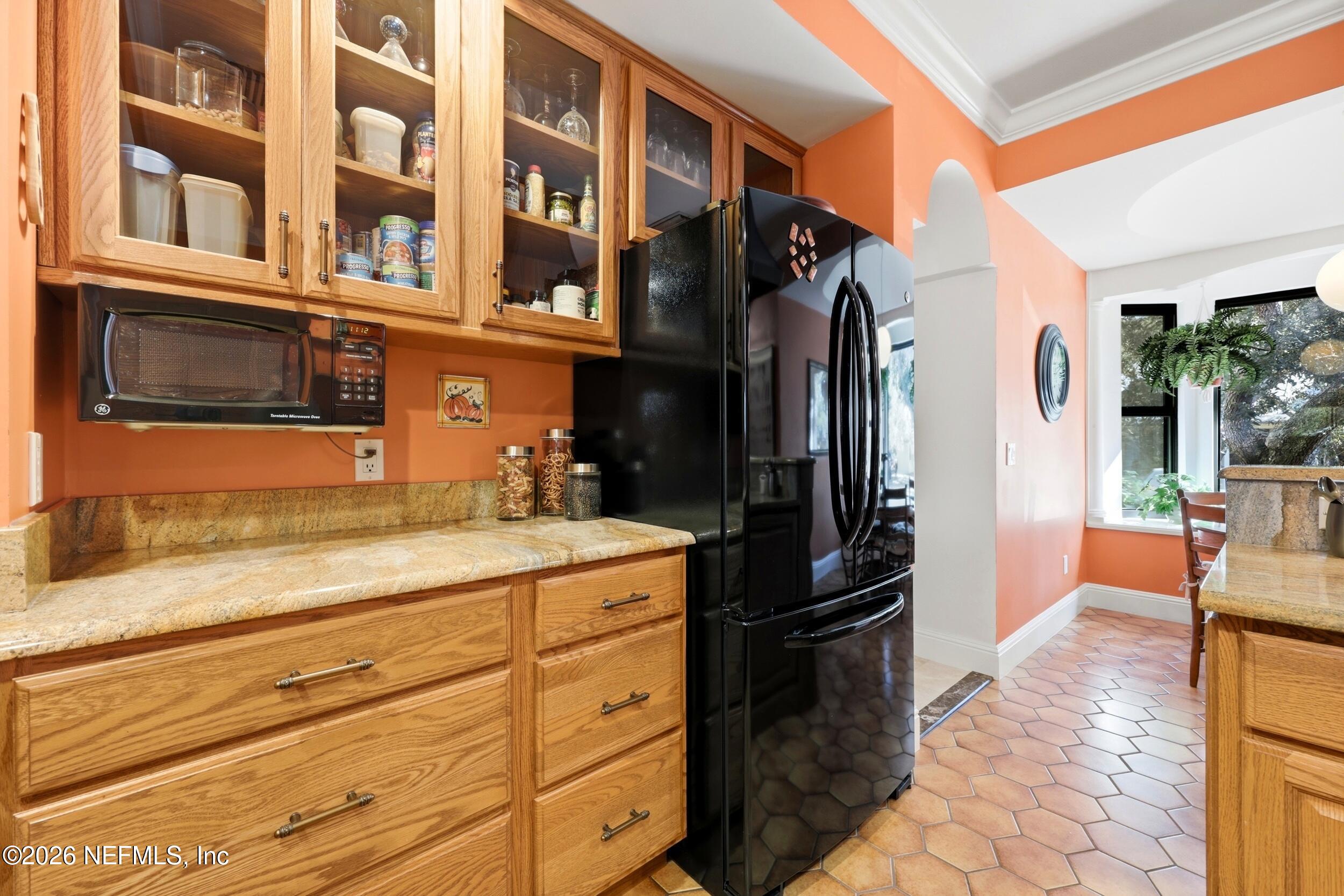 10 Lydia Lane St. Augustine, FL 32080 - Photo 21 of 119 a kitchen view with stainless steel appliances granite countertop a refrigerator and a stove