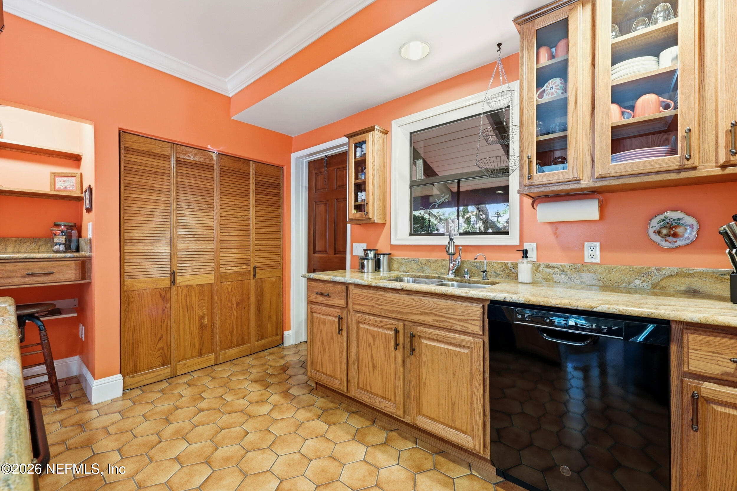 10 Lydia Lane St. Augustine, FL 32080 - Photo 23 of 119 a kitchen with granite countertop a sink and a refrigerator
