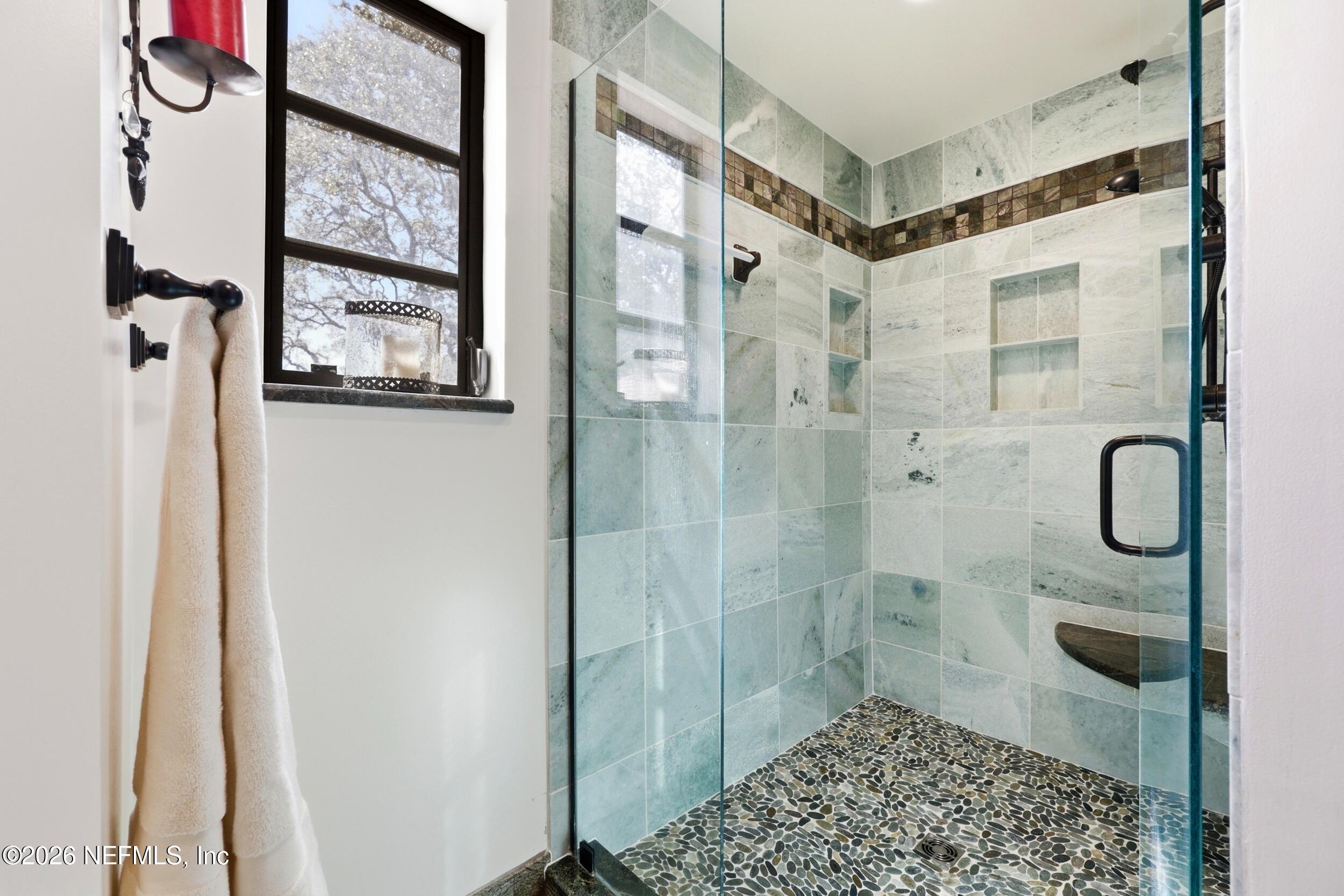 10 Lydia Lane St. Augustine, FL 32080 - Photo 31 of 119 a bathroom with a shower