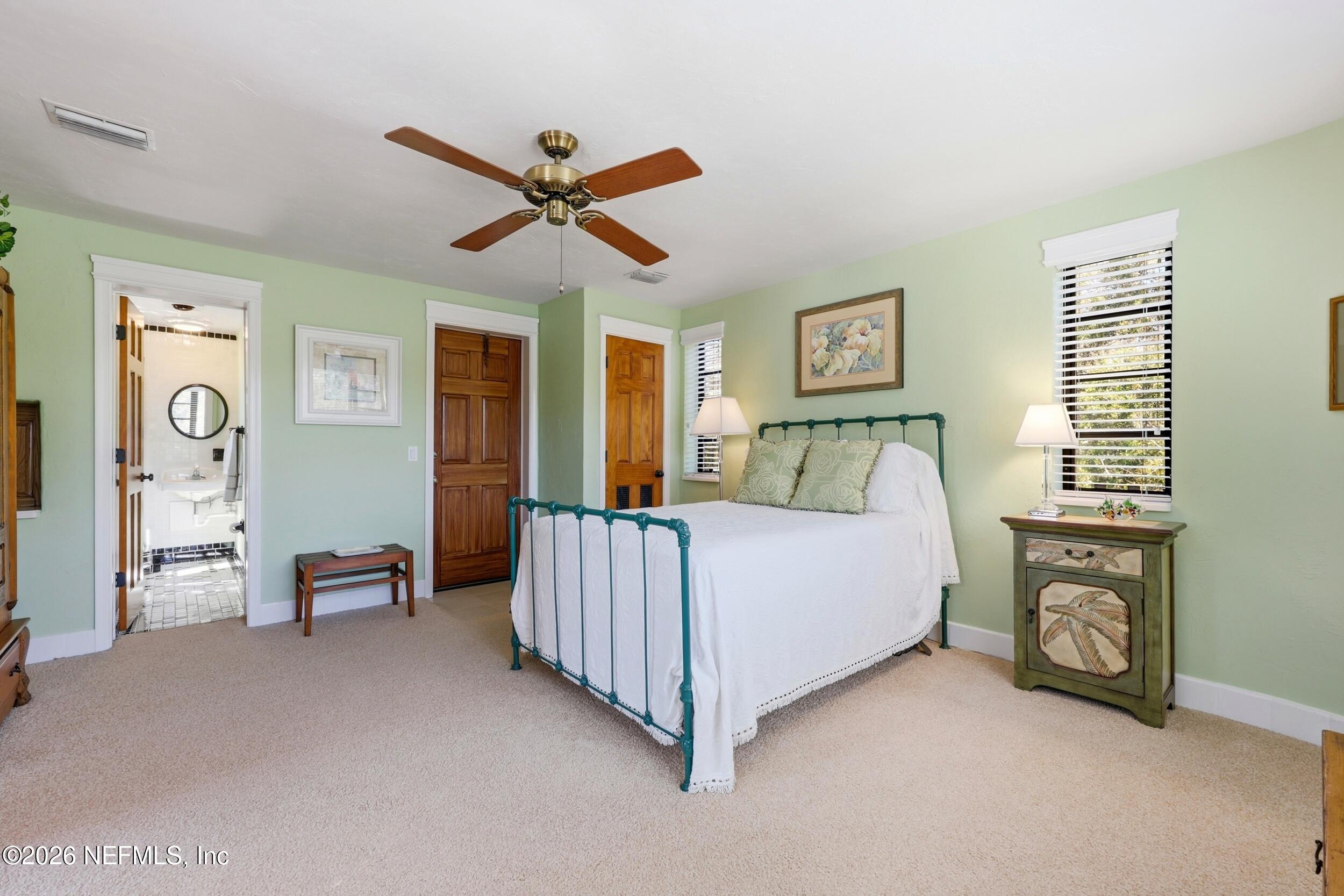 10 Lydia Lane St. Augustine, FL 32080 - Photo 38 of 119 a spacious bedroom with a bed and a window