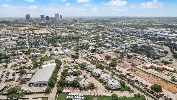 an aerial view of residential building with parking space