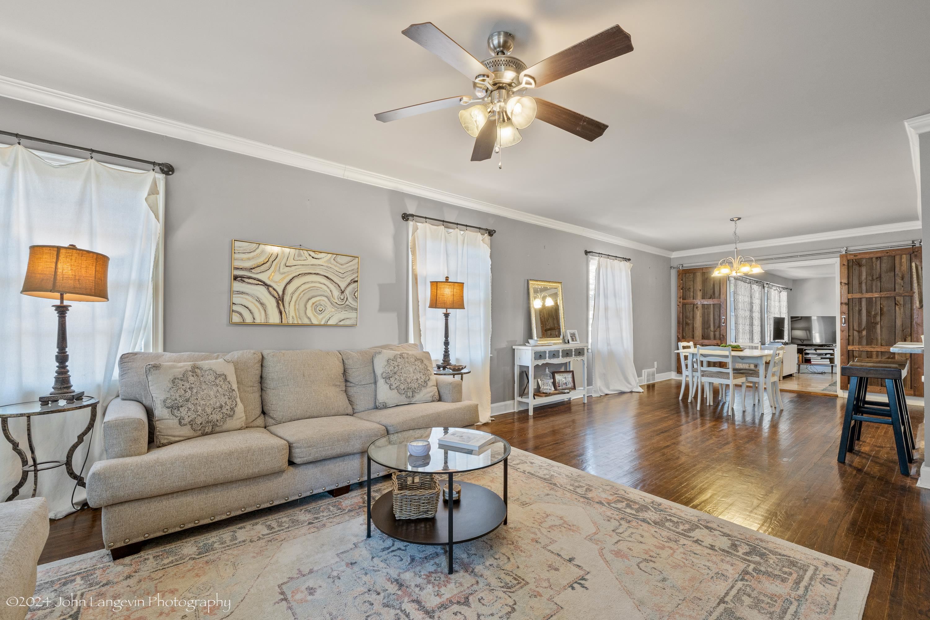 3381 Walnut Grove Road Memphis, TN 38111 - Photo 14 of 25 a living room with furniture and a large window