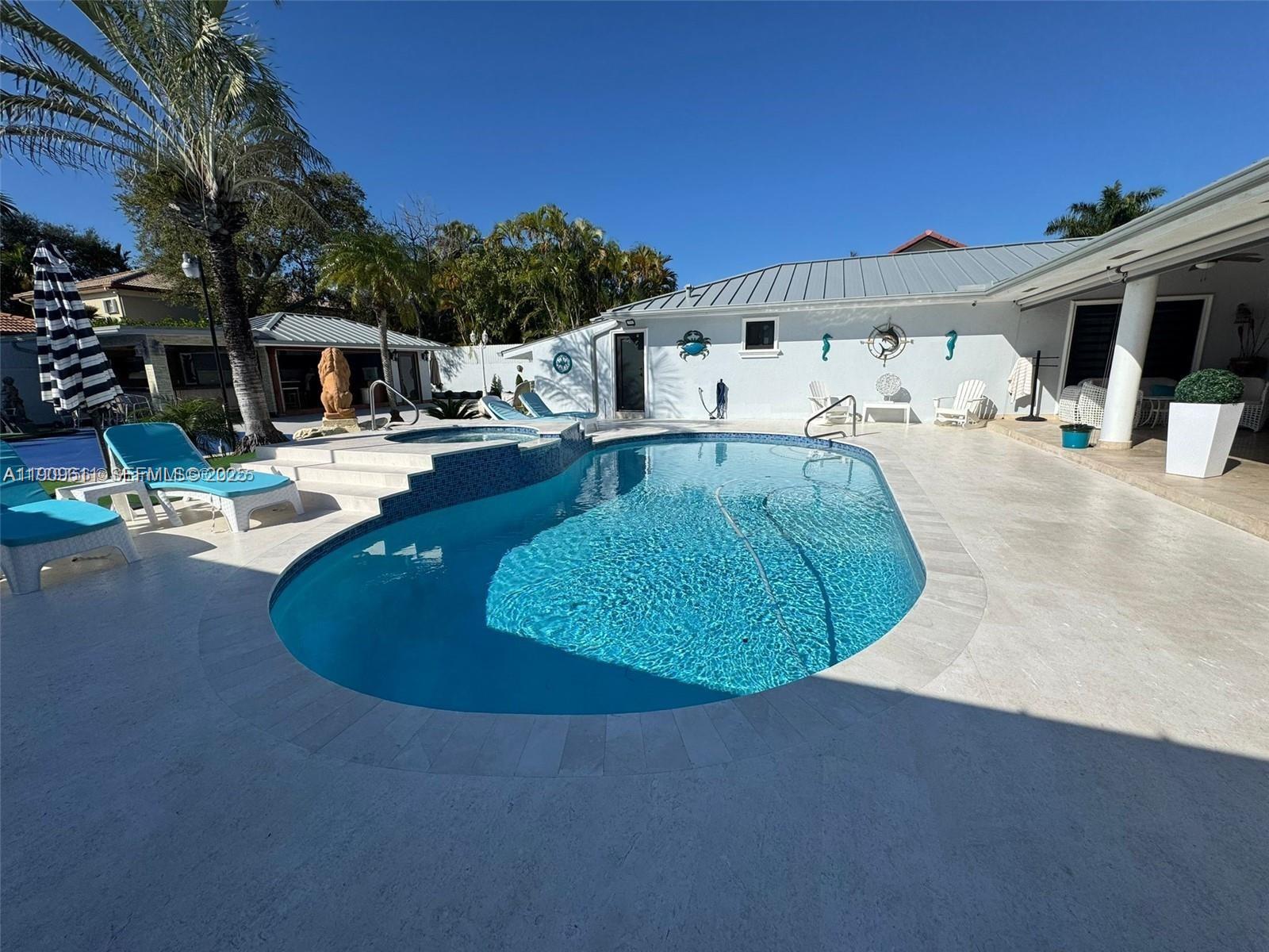 3690 Southwest 139th Avenue Miami, FL 33175 - Photo 11 of 11 a view of a swimming pool with a yard
