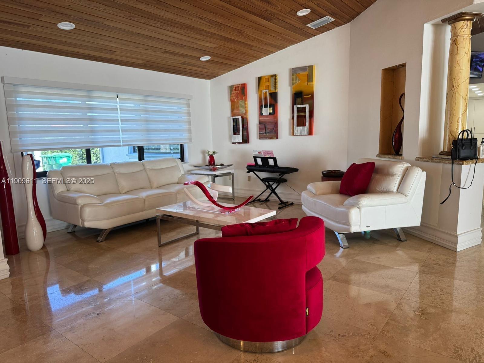 3690 Southwest 139th Avenue Miami, FL 33175 - Photo 2 of 11 a living room with furniture and a window