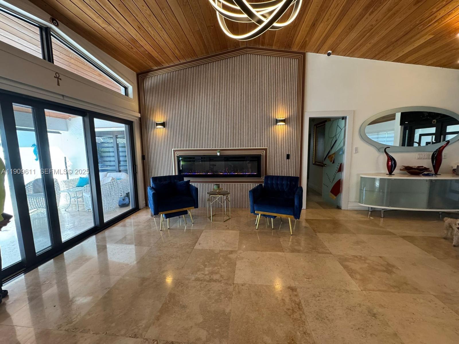 3690 Southwest 139th Avenue Miami, FL 33175 - Photo 3 of 11 a view of a livingroom with furniture and a fireplace