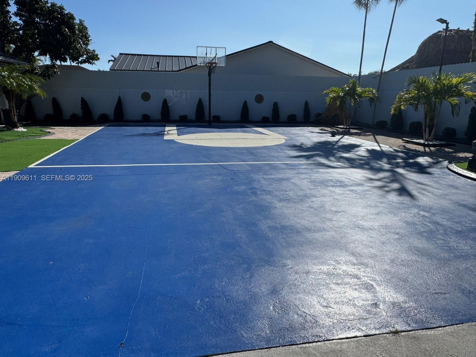 3690 Southwest 139th Avenue Miami, FL 33175 - Photo 10 of 11 a backyard of a house with table and chairs