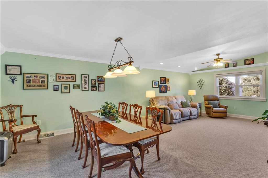 213 Whittier Street Vandergrift, PA 15690 - Photo 14 of 37 a view of a dining room with furniture