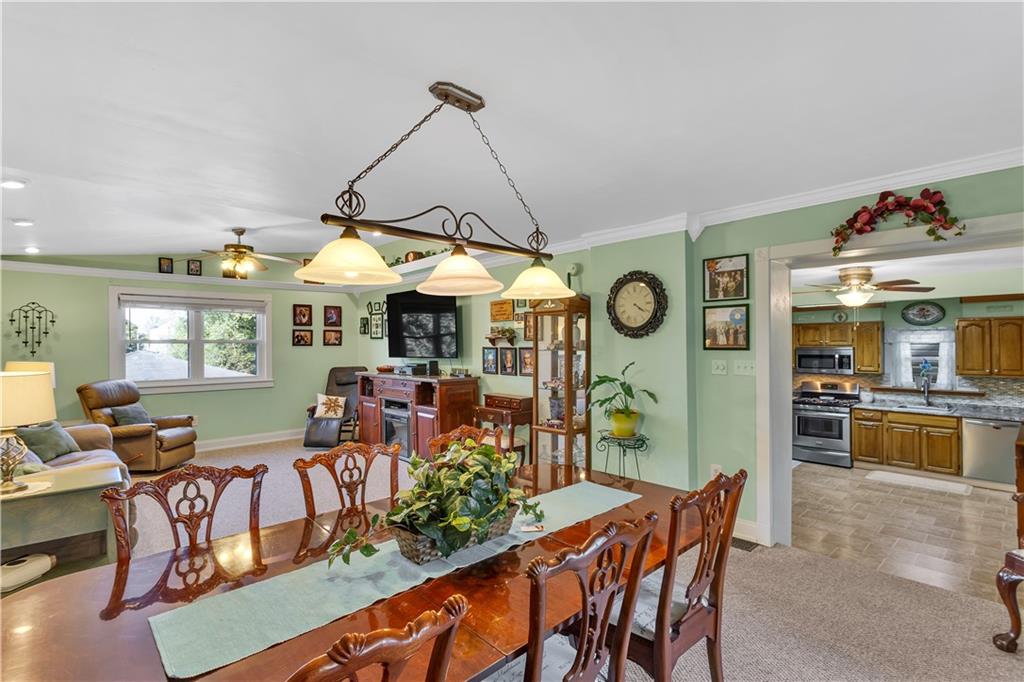 213 Whittier Street Vandergrift, PA 15690 - Photo 15 of 37 a view of a dining room with furniture window and outside view