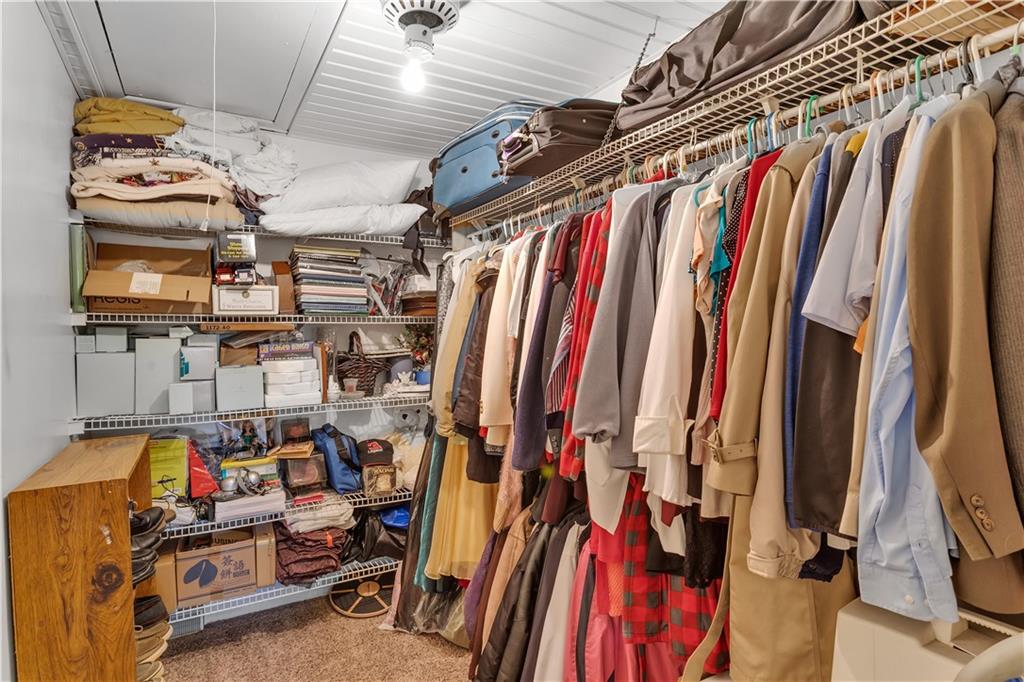 213 Whittier Street Vandergrift, PA 15690 - Photo 21 of 37 a view of walk in closet with clothes and shoes