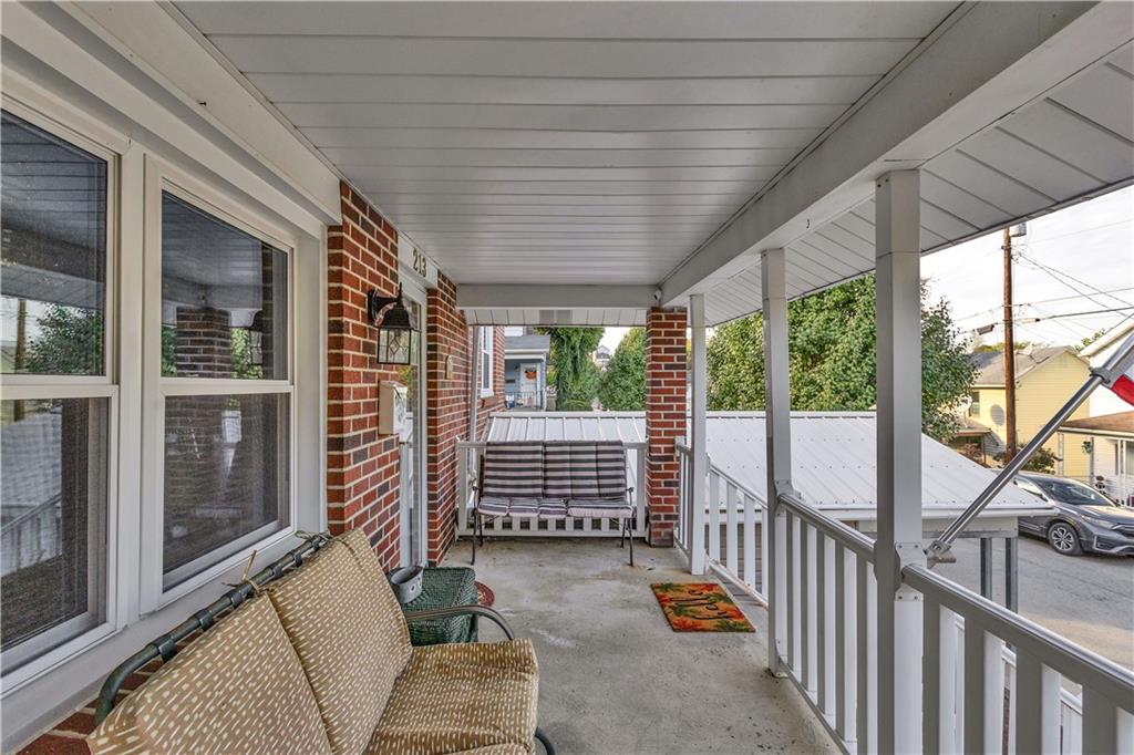 213 Whittier Street Vandergrift, PA 15690 - Photo 4 of 37 a view of porch with furniture