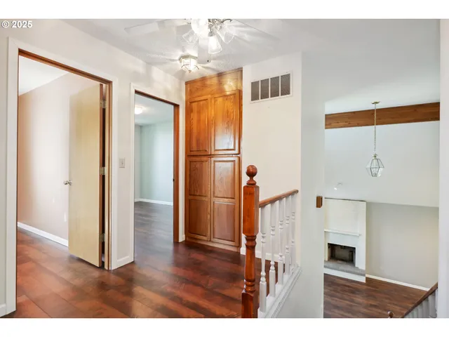 a view of a livingroom with wooden floor
