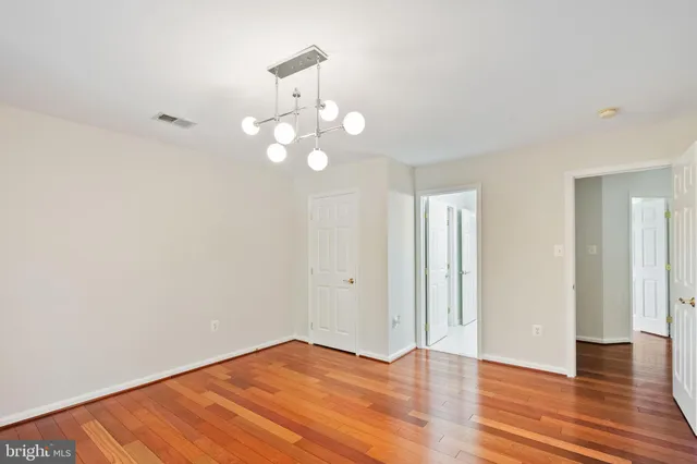 a view of a room with white walls