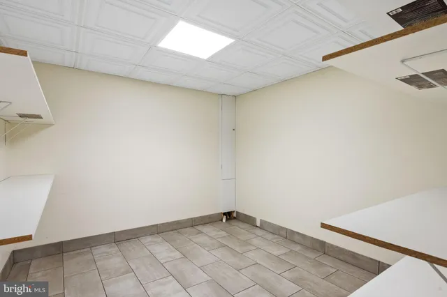 a view of a wooden deck with a bench