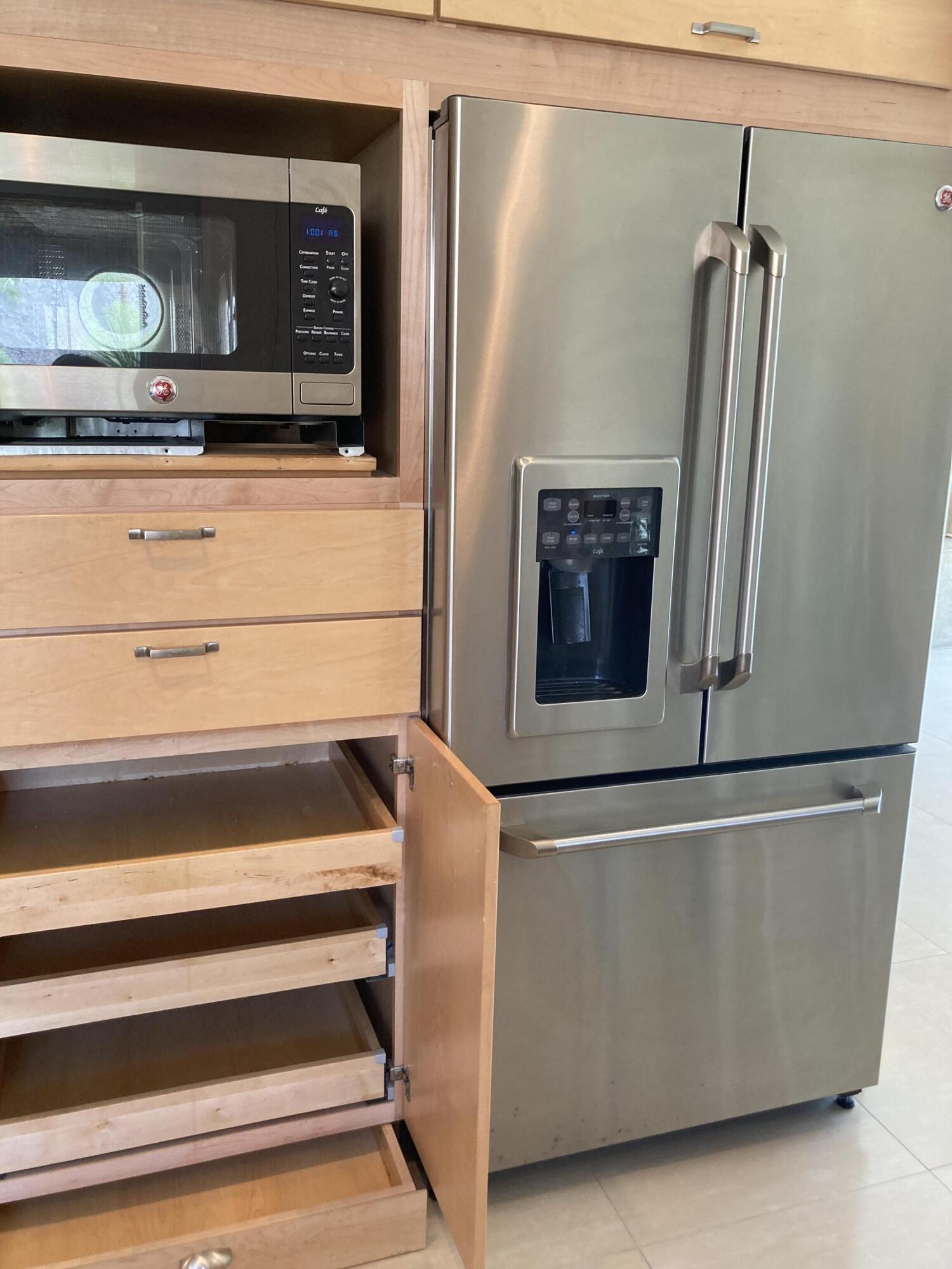 45760 Pima Road Indian Wells, CA 92210 - Photo 12 of 28 a view of washer and dryer with wooden floor