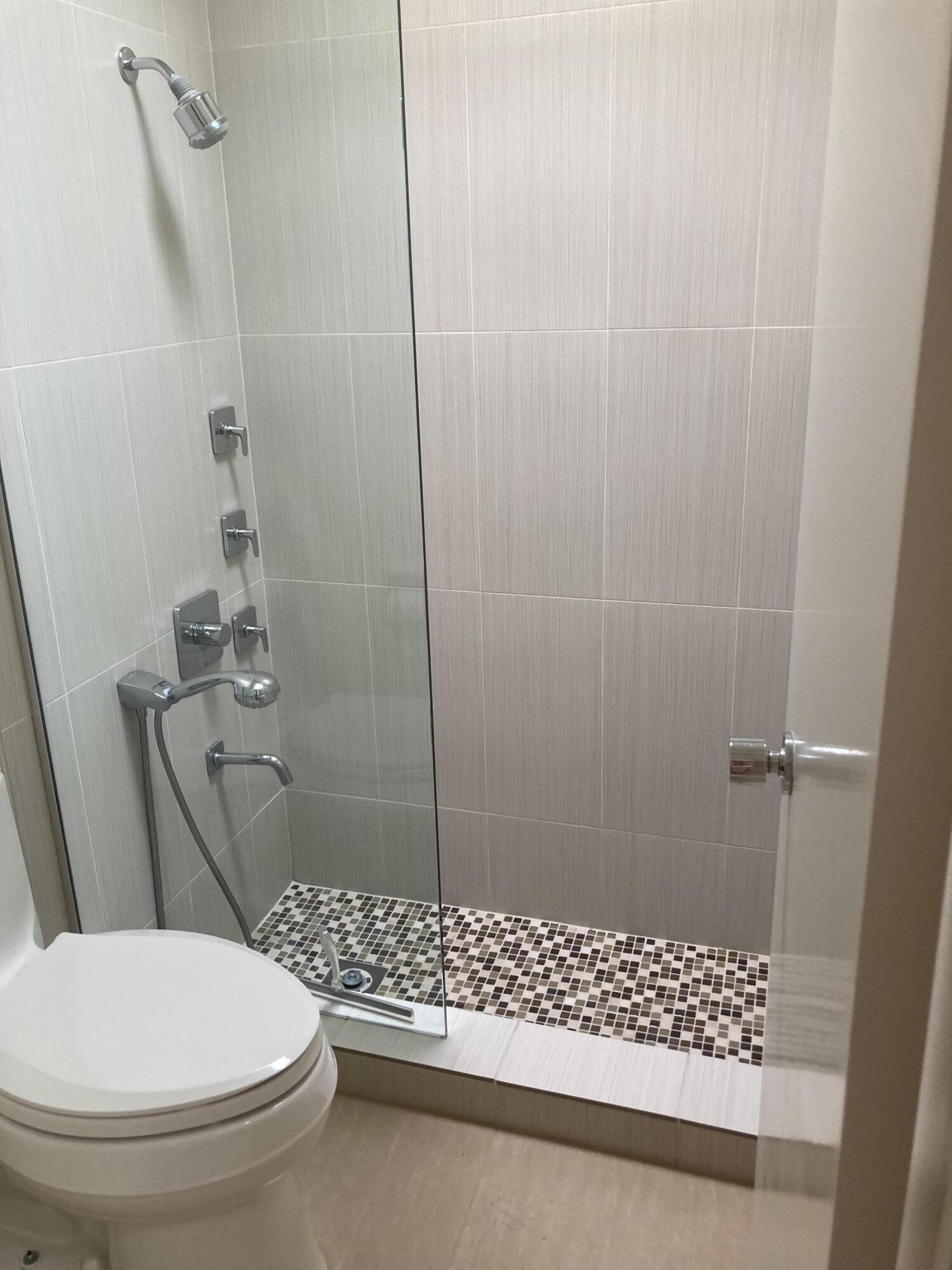 45760 Pima Road Indian Wells, CA 92210 - Photo 21 of 28 a bathroom with a toilet and shower